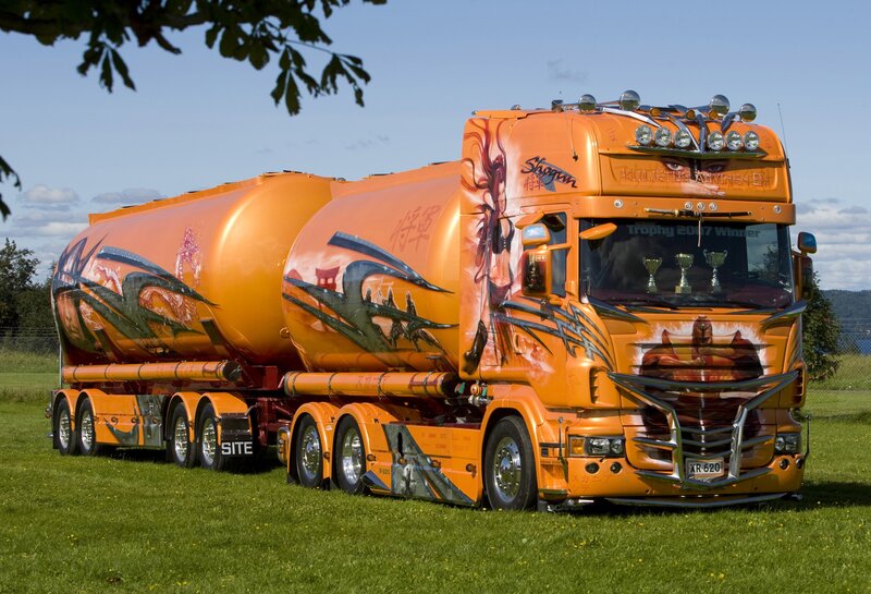 Orange tanker truck with custom paint