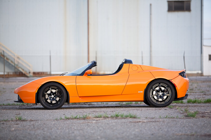 orange Tesla Roadster sports car