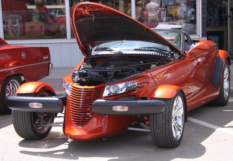 Orange Three-wheeled Car