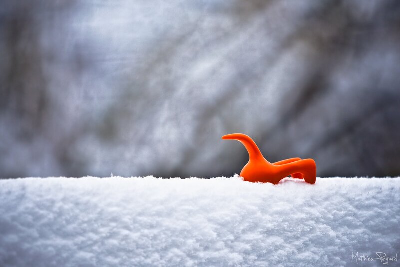 Orange toy in the snow