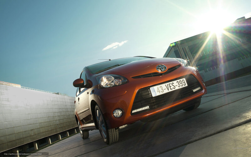 Orange Toyota Aygo in sunlight