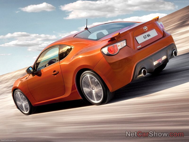 Orange Toyota GT-86 in motion