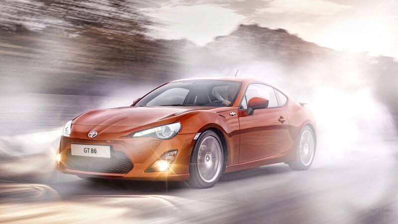 Orange Toyota GT-86 in motion