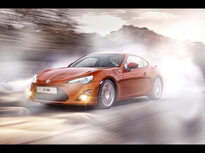 Orange Toyota GT86 in motion