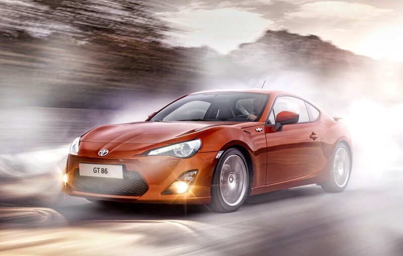 Orange Toyota GT86 in motion