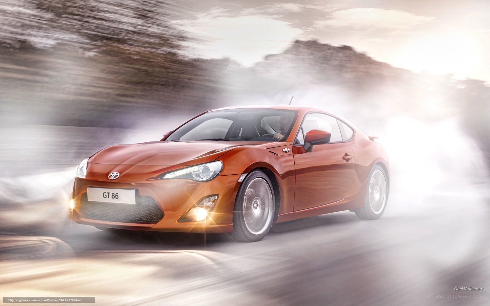 Orange Toyota GT86 in motion