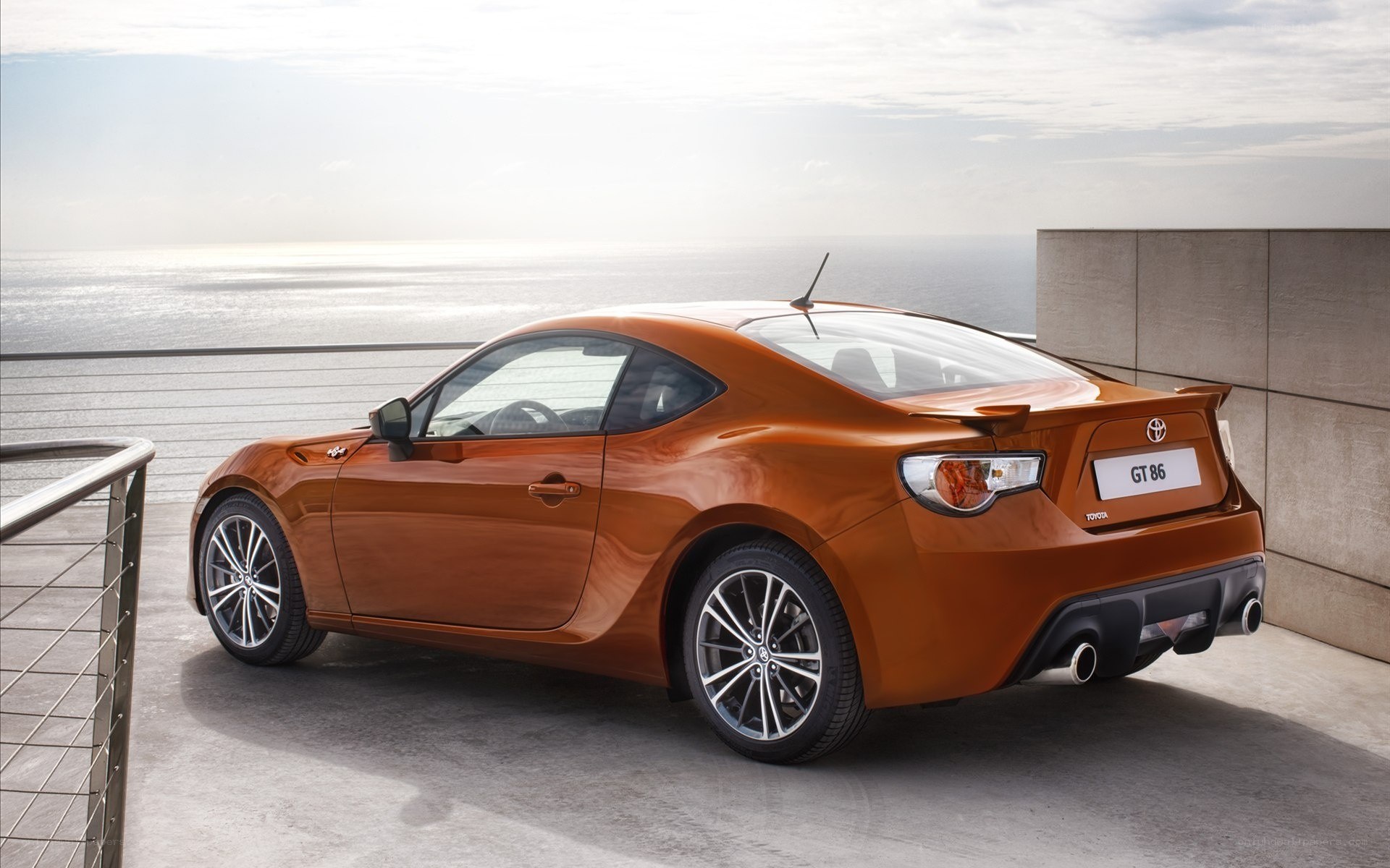 Orange Toyota GT86 on a deck