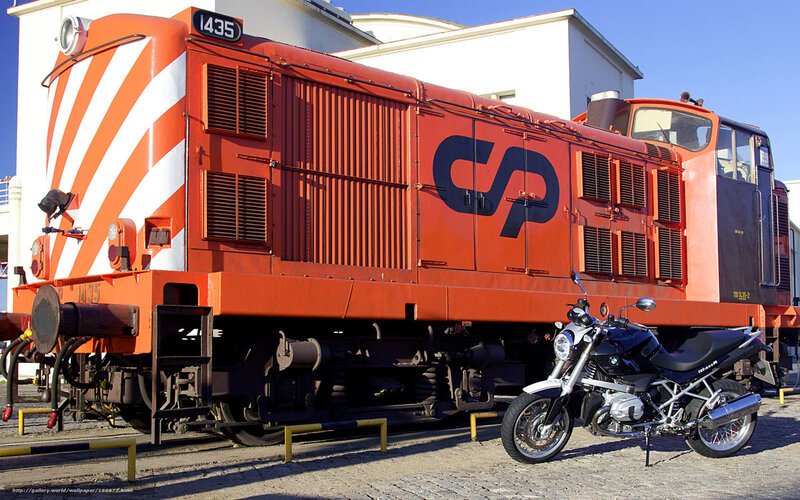 Orange train and motorcycle