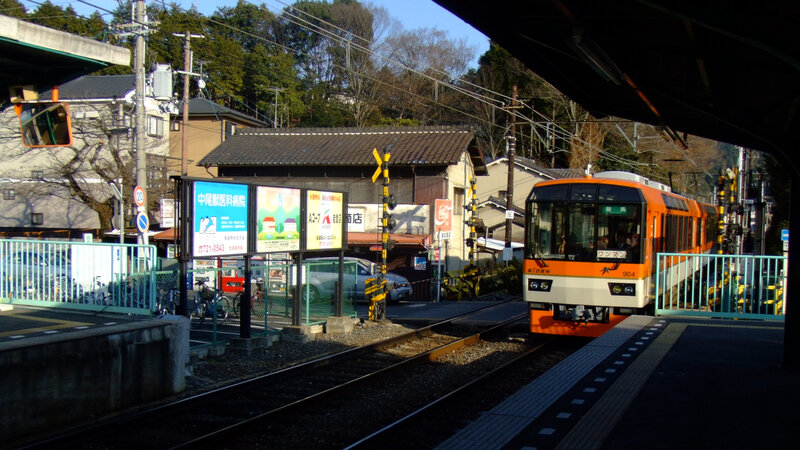 Orange Train at Station