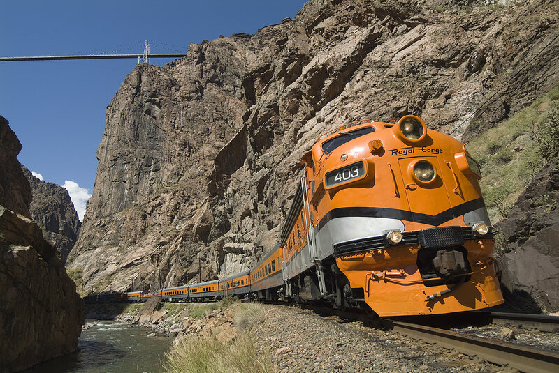Orange train in a canyon