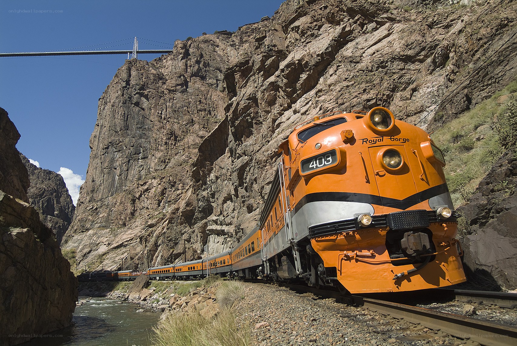 Orange train in a canyon