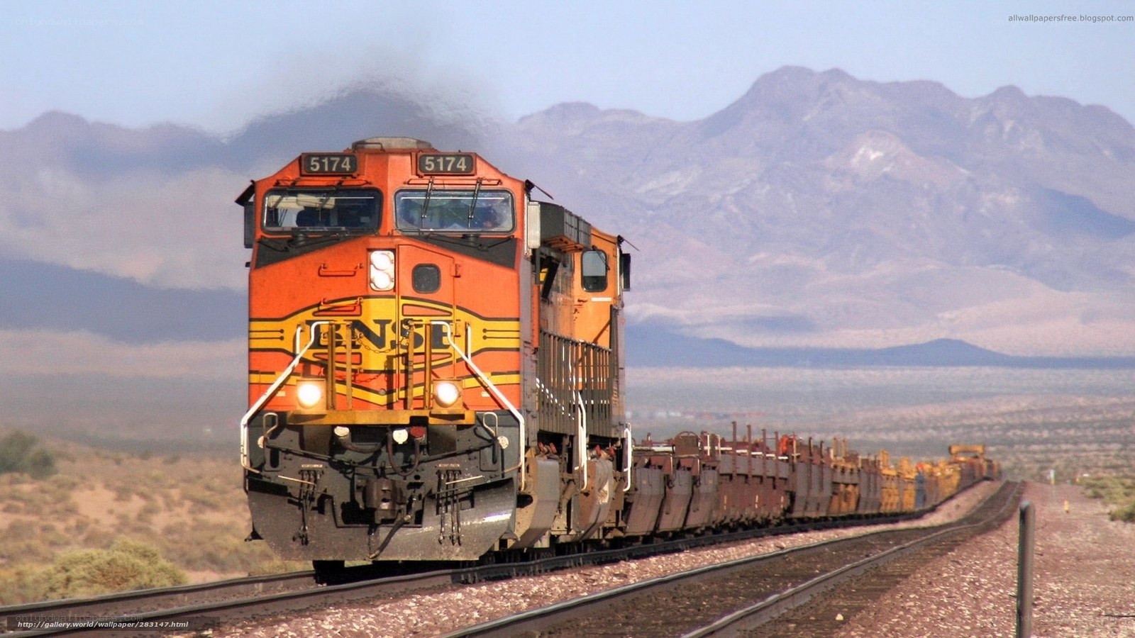 orange train in desert landscape