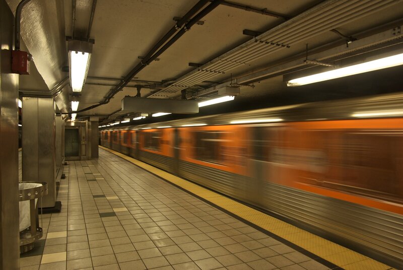 Orange Train in Station