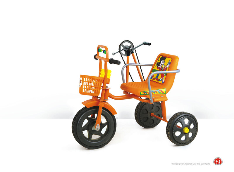 Orange tricycle for children