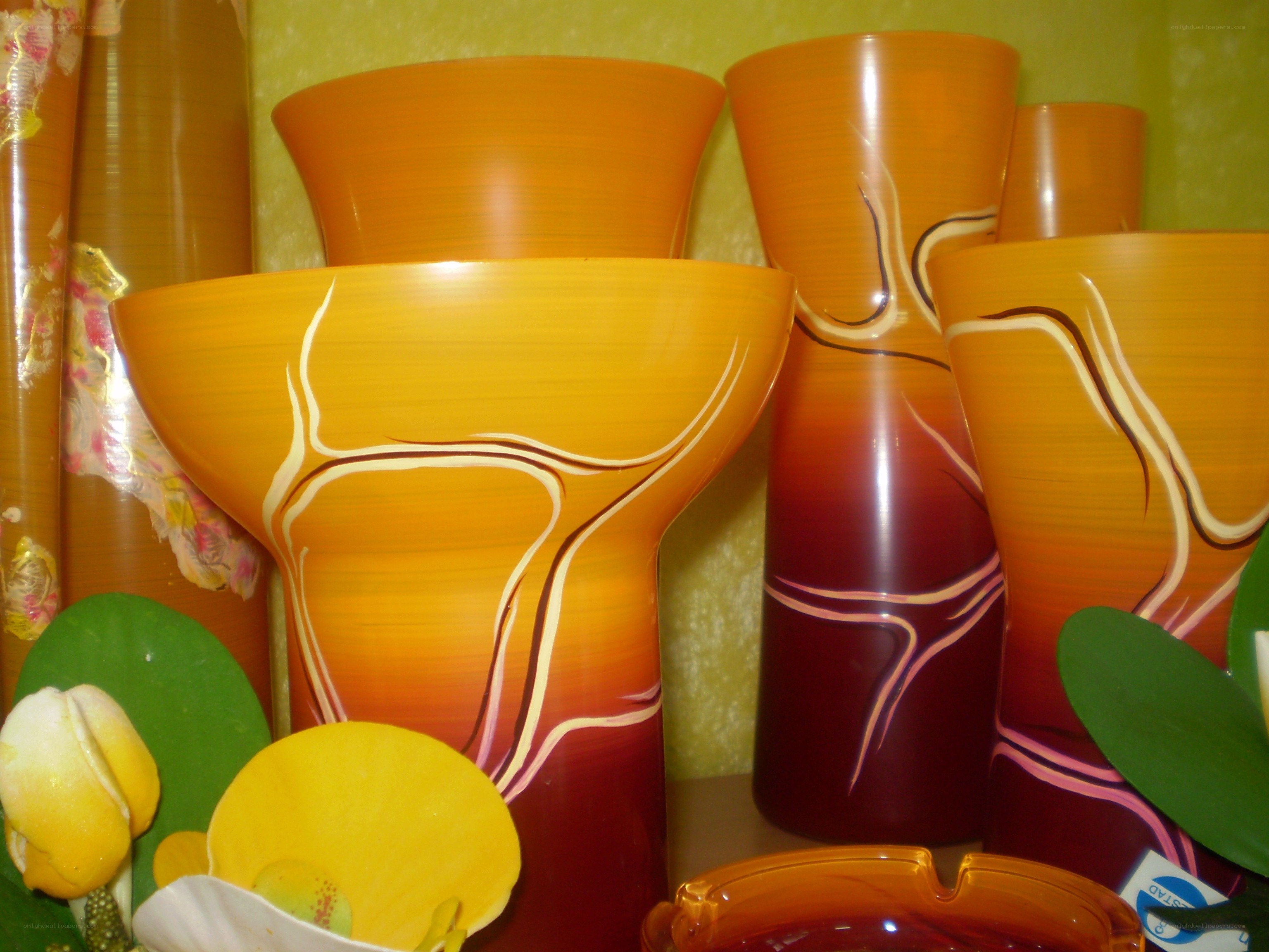 Orange vases with floral patterns