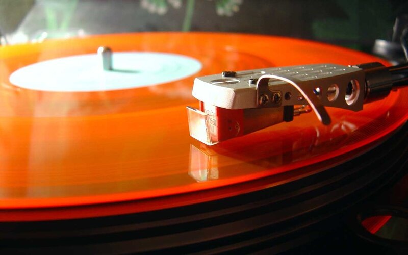 orange vinyl record playing