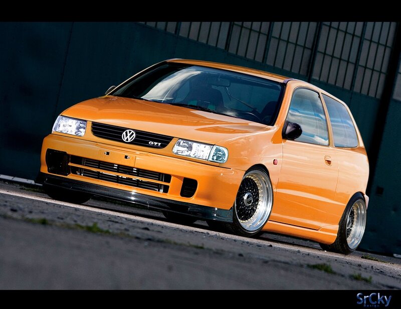 orange volkswagen gti hatchback