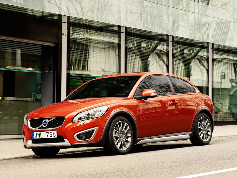 Orange Volvo C30 parked on street