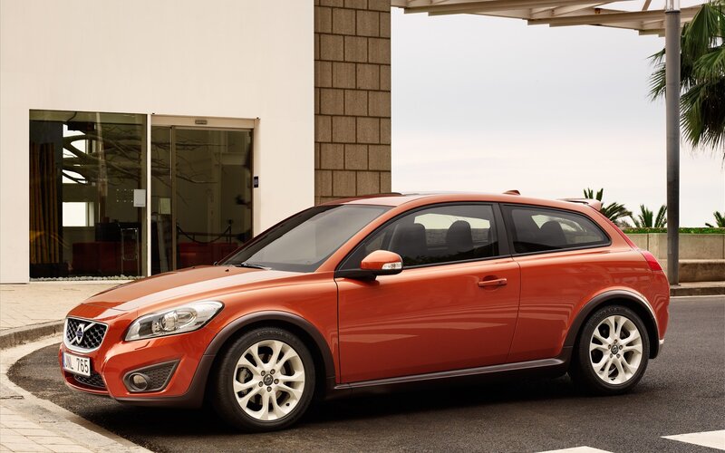 Orange Volvo C30 parked outside