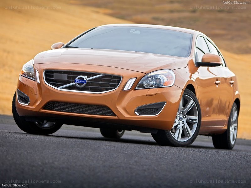 orange volvo s60 sedan
