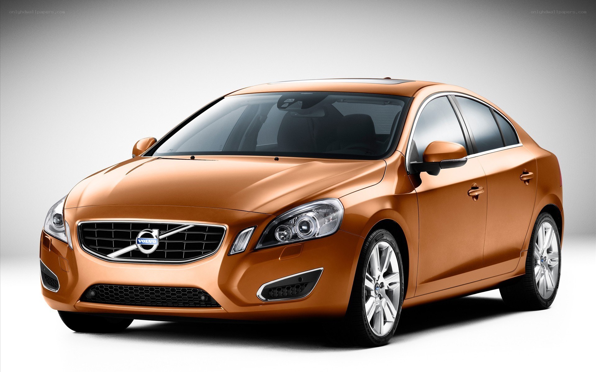orange volvo s60 sedan