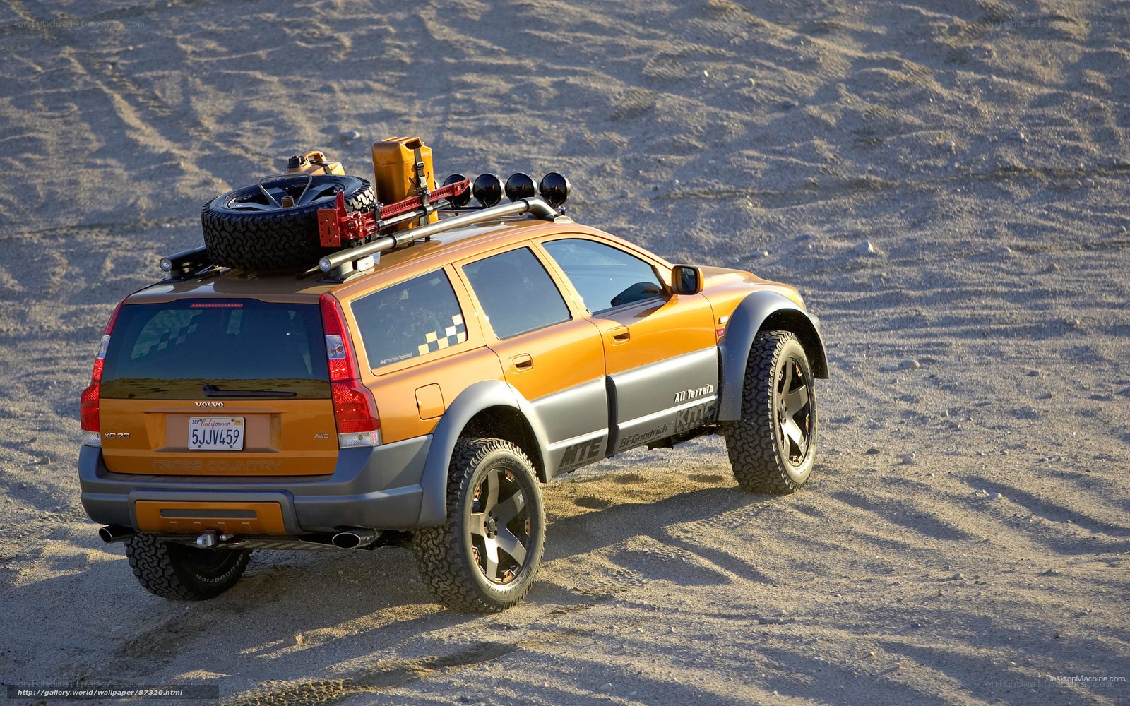orange volvo xc70 off-road