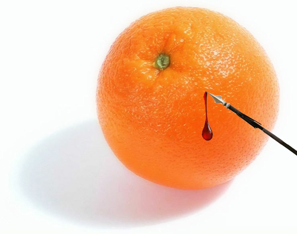 orange with blood droplet