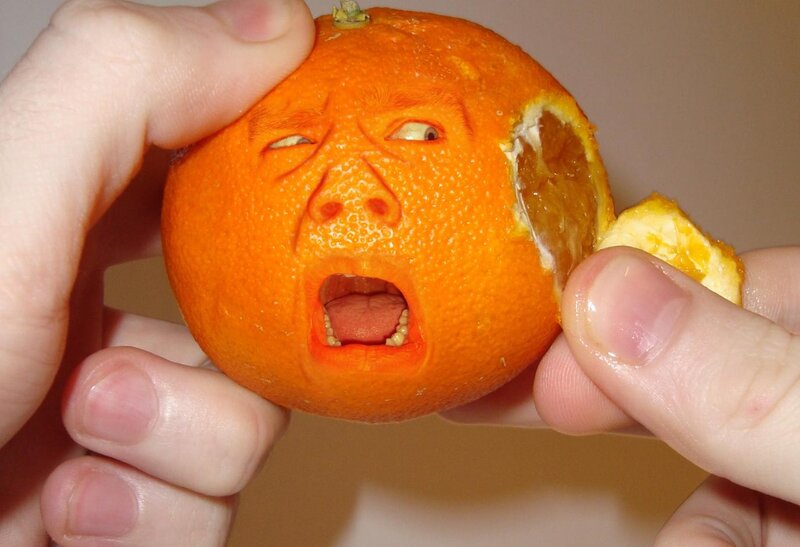 Orange with Carved Face — Disturbing
