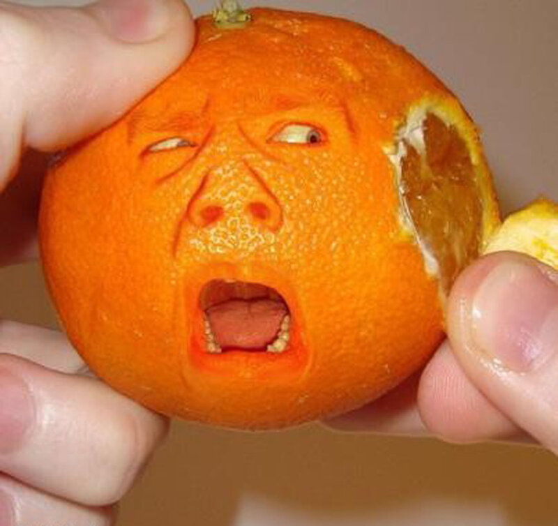 Orange with Carved Face