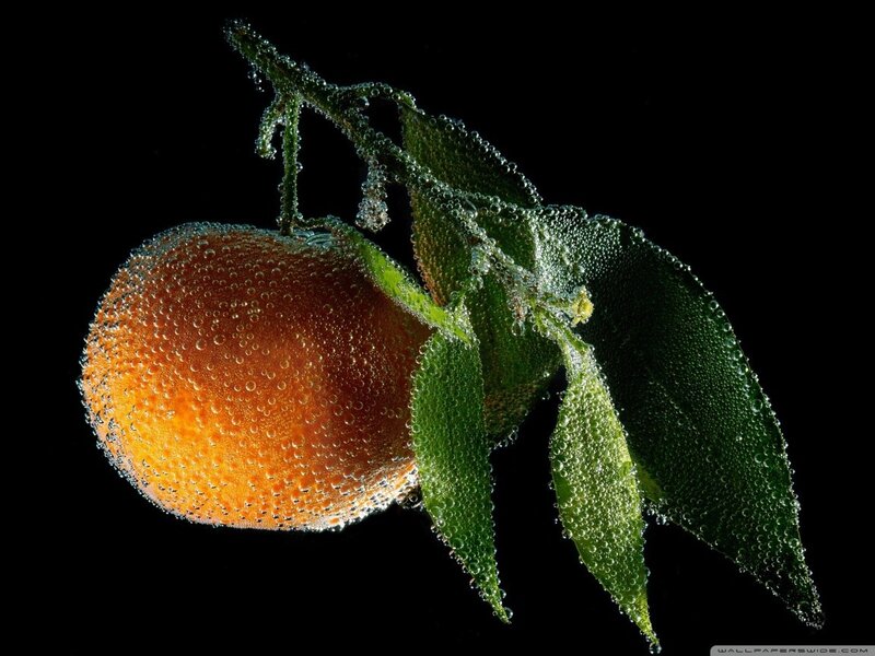 Orange with dew drops