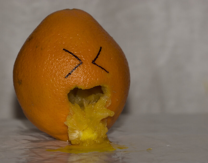 orange with drawn face