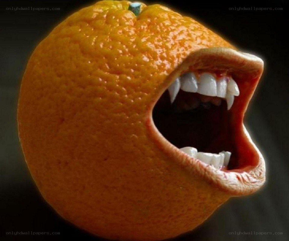orange with vampire teeth