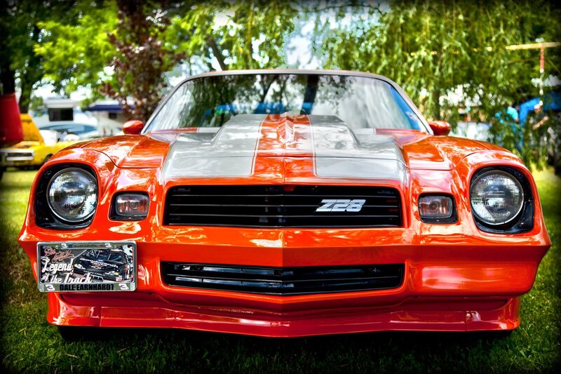 Orange Z28 Camaro at car show