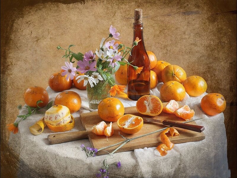 Oranges and Flowers on Table