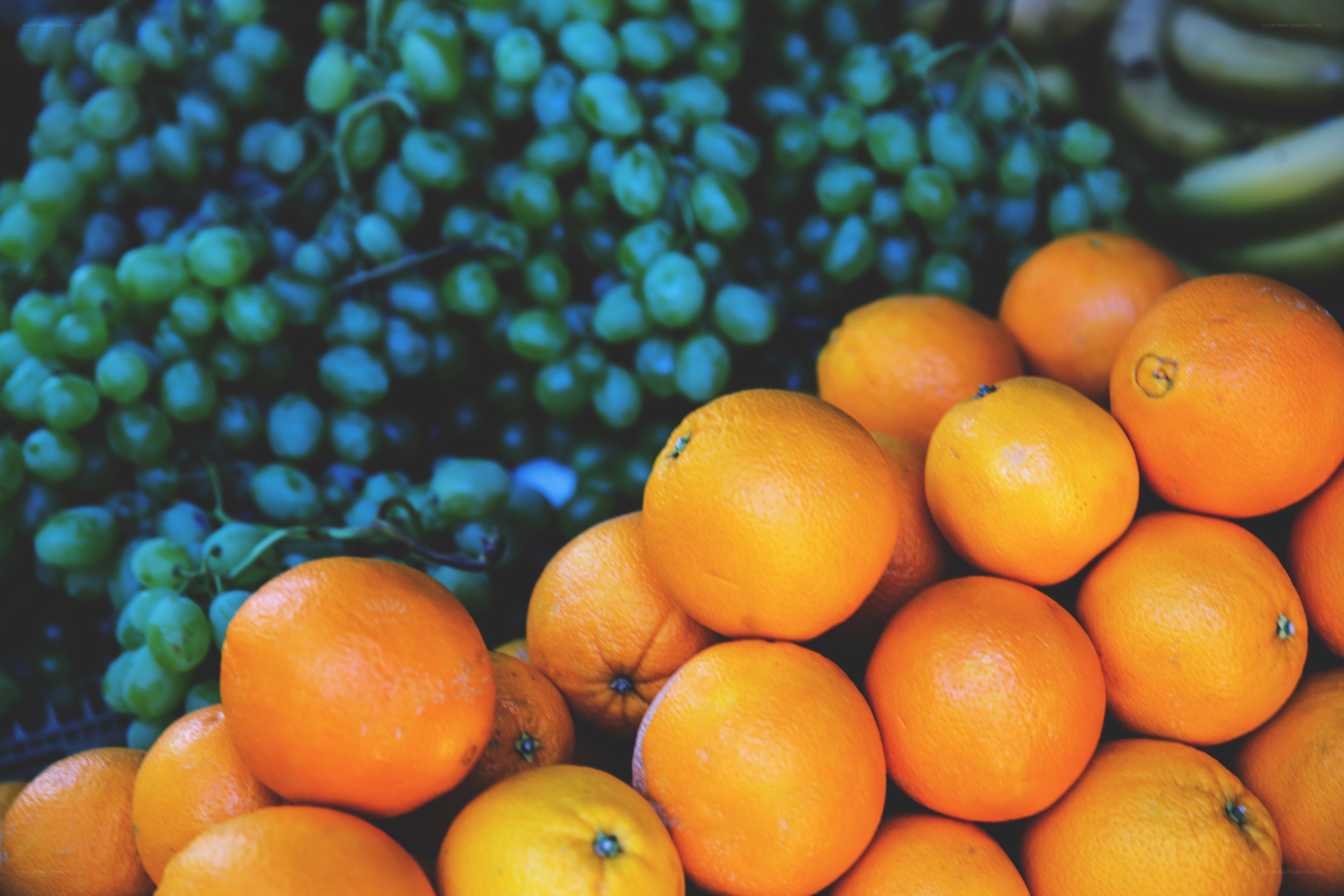 Oranges and grapes at market