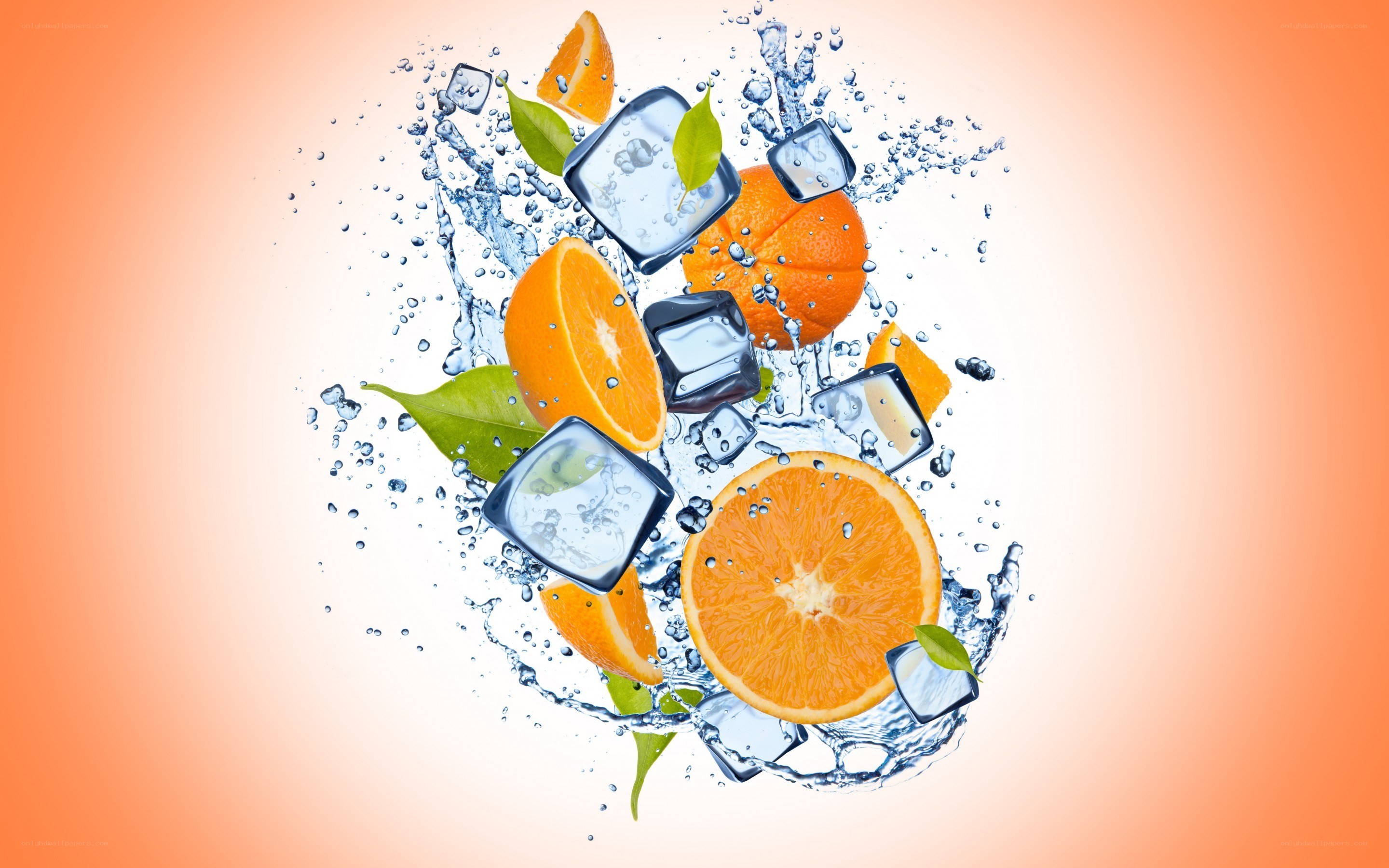 Oranges and ice in water splash