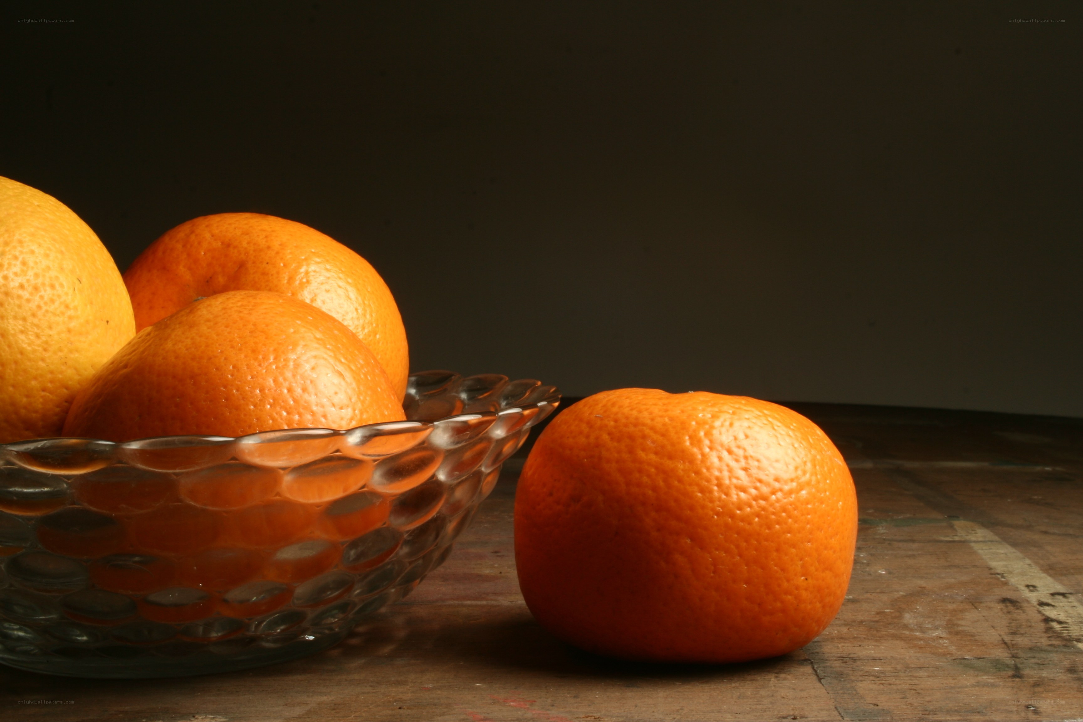Oranges in a glass bowl
