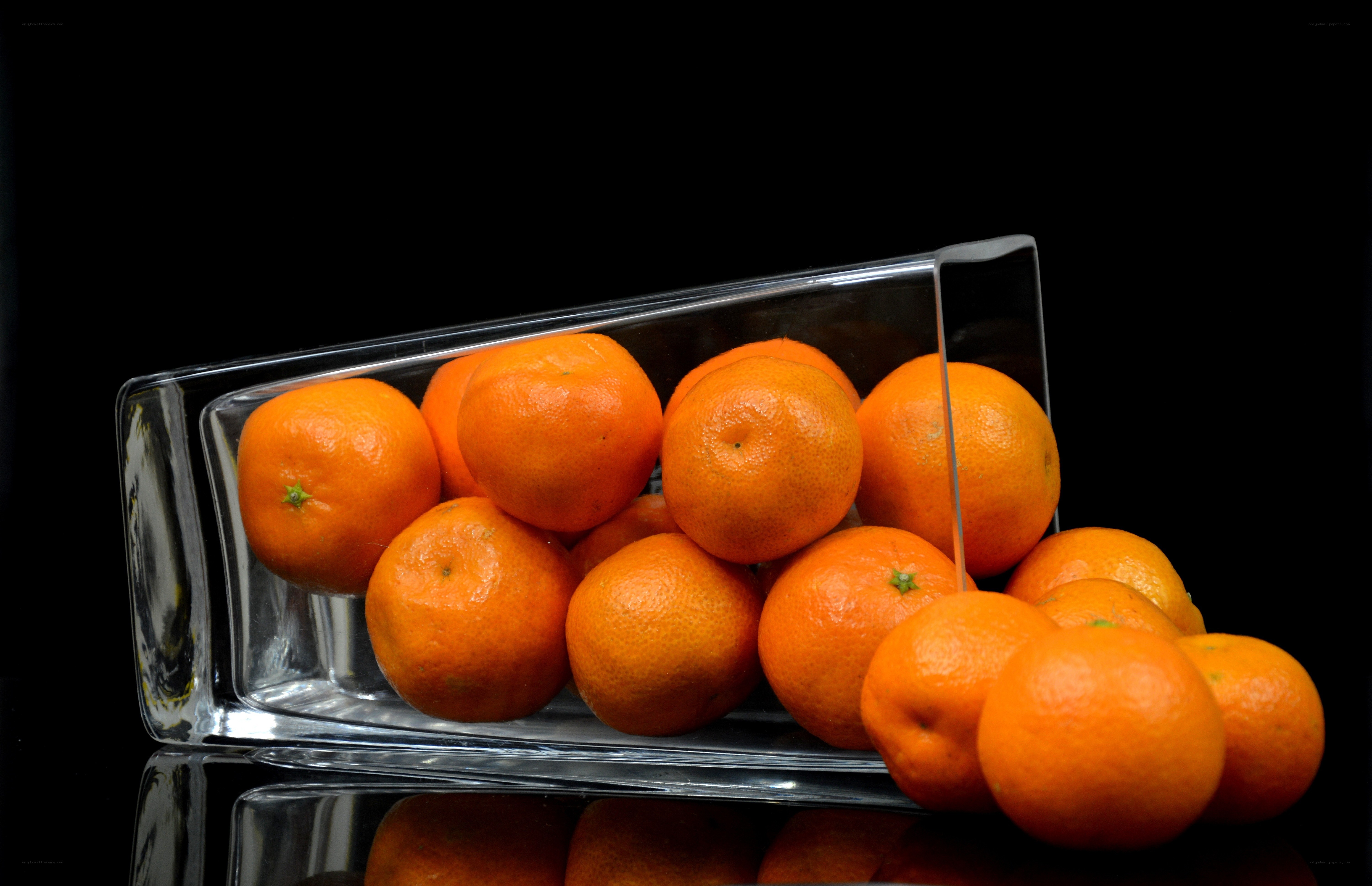 Oranges in a glass container