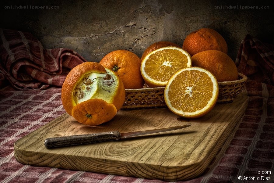 Oranges on a wooden board