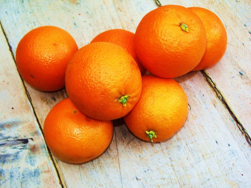 Oranges on Wooden Surface