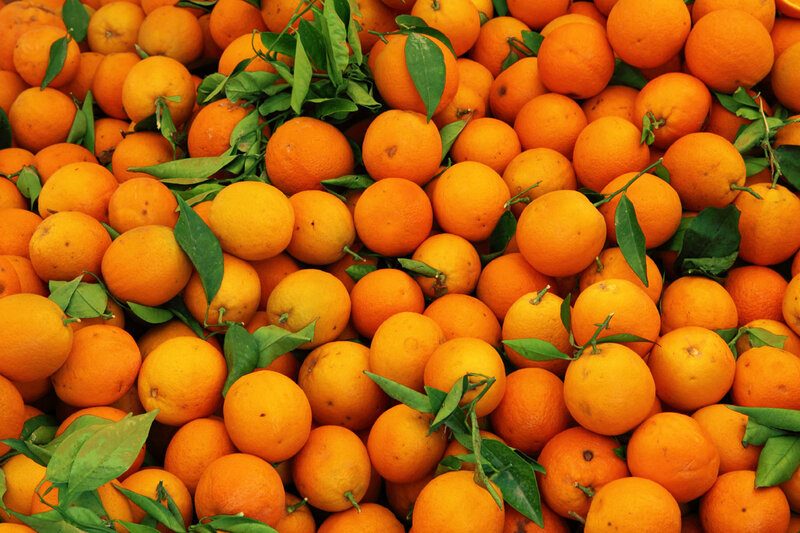 Oranges with Green Leaves — Orange