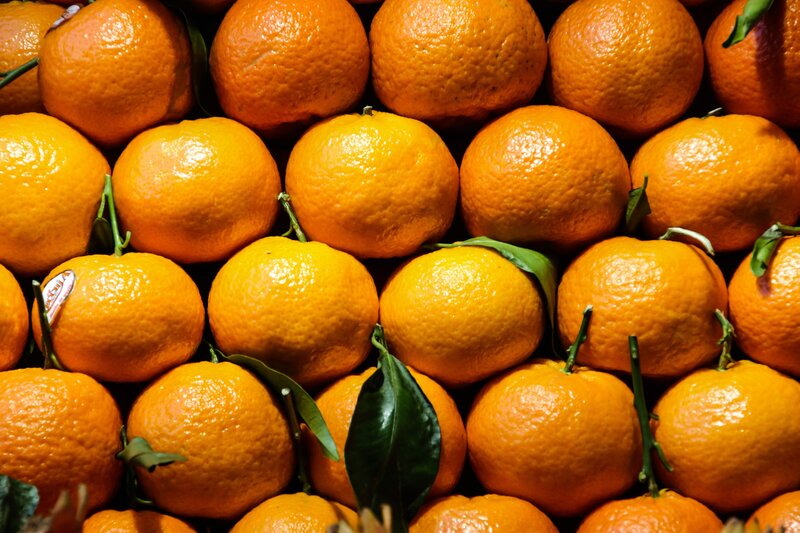 Oranges with Green Leaves — Orange, Vibrant