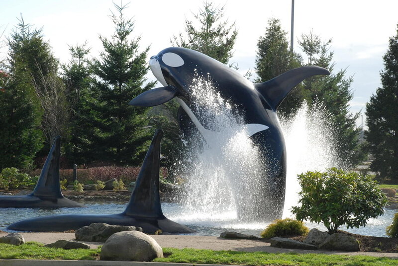 Orca whale sculpture fountain