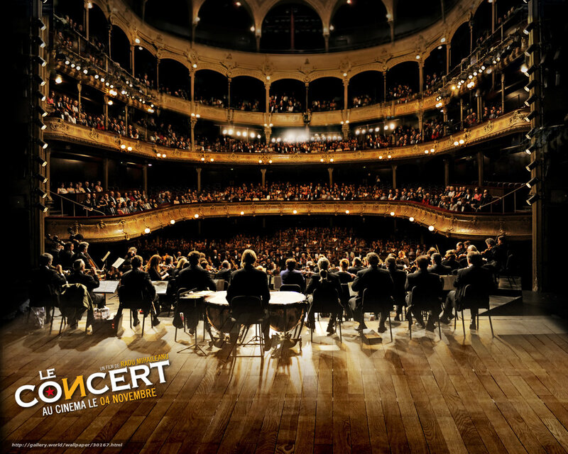 Orchestra performing in a grand theater