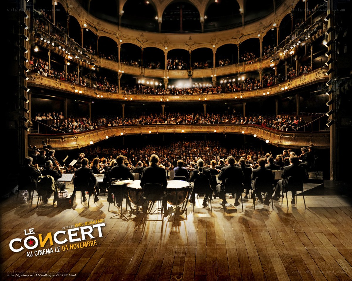 Orchestra performing in a grand theater