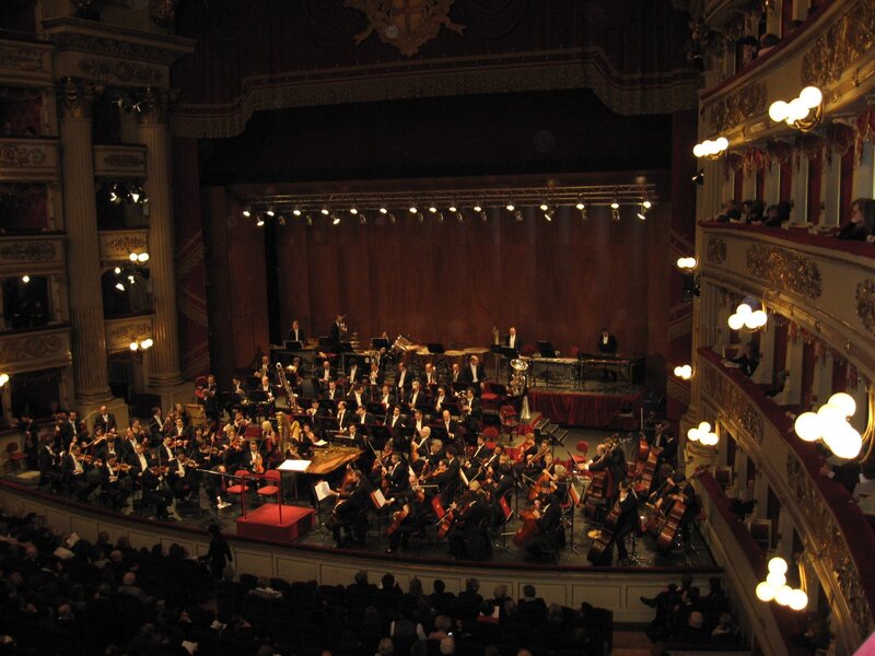Orchestra Performing in Theater