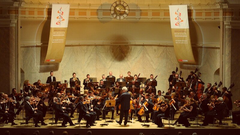 Orchestra performing on stage