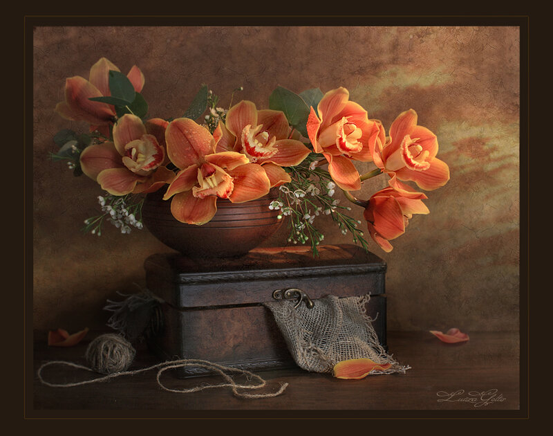 Orchid bouquet in a wooden box