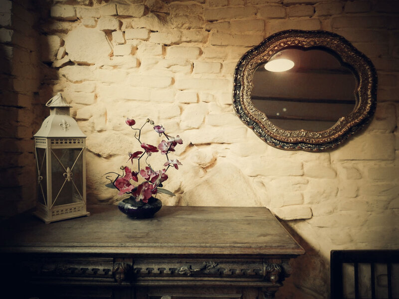 Orchid in Vase on Table