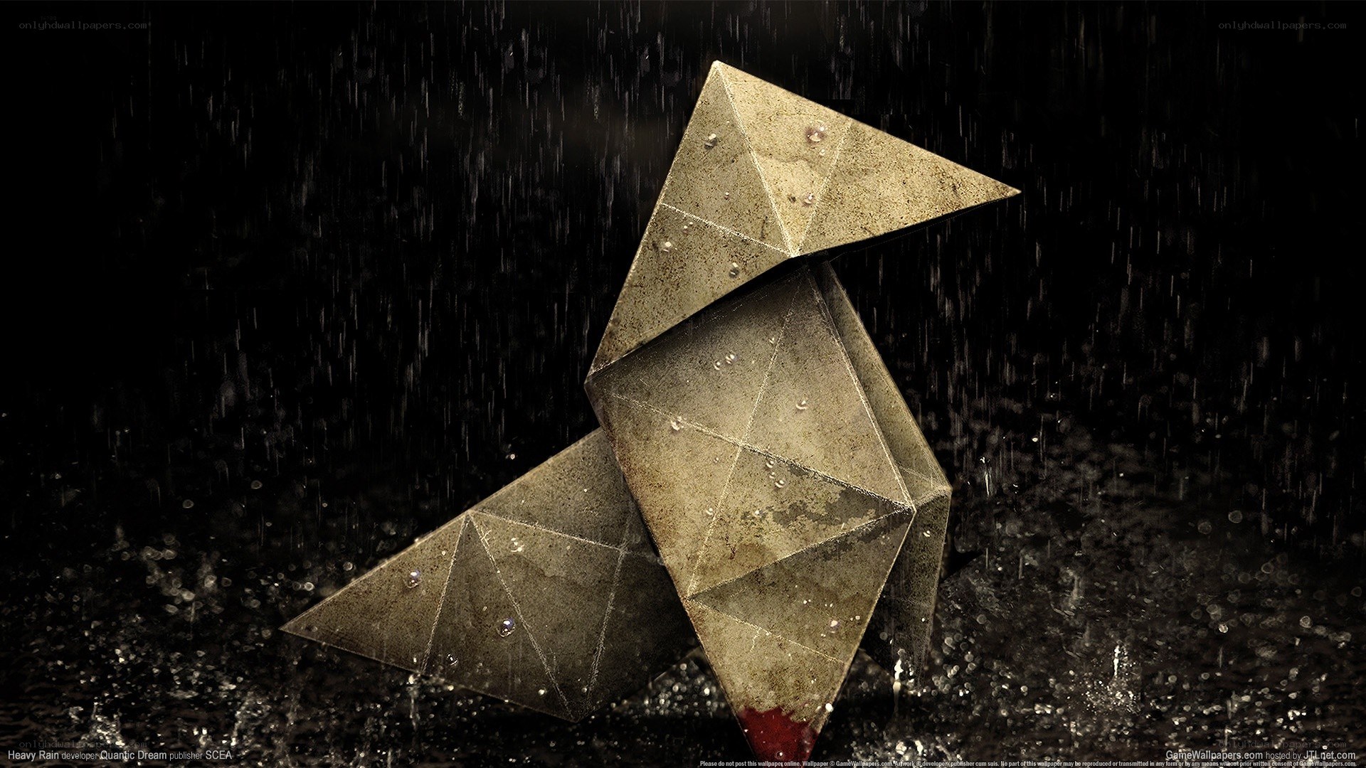 Origami bird in heavy rain